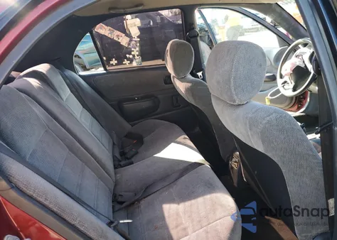 1997 Toyota Corolla Dx из США, поврежденный, VIN 1NXBB02EXVZ510072